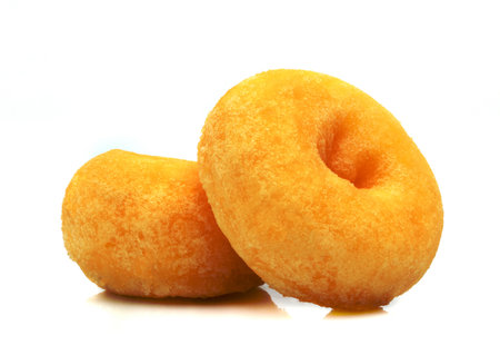 small sugar ring donut isolated on white backgroundの写真素材