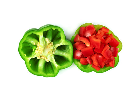 red green sweet bell pepper sliced isolated on white backgroundの写真素材