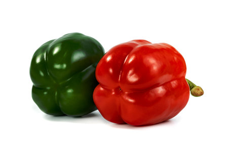 red green sweet bell pepper isolated on white backgroundの写真素材