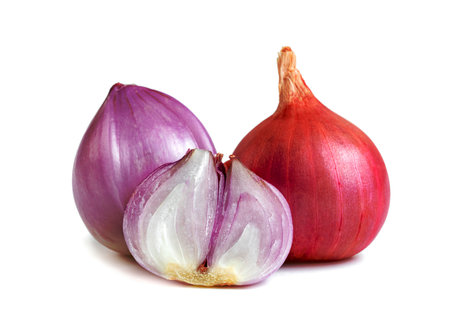 shallots onion cut in half isolated on a white backgroundの写真素材