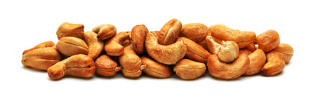 Roasted cashew nuts isolated on white backgroundの写真素材