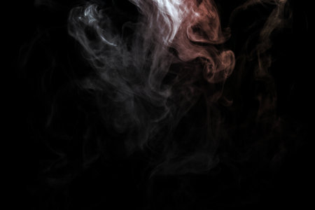 Abstract powder or smoke effect isolated on black backgroundの写真素材