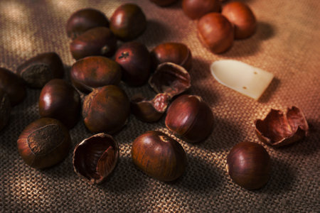 fresh chestnuts with sack bag backgroundの写真素材