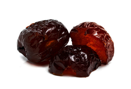 Chinese date or Jujube or monkey apple in syrup isolated on white backgroundの写真素材