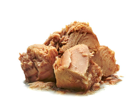 Canned tuna chunk in vegetable oil isolated on white backgroundの写真素材