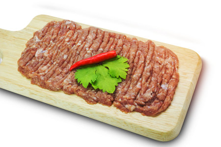 Raw minced pork on cutting board,clipping pathの写真素材