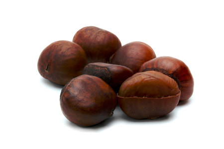 peeled roasted chestnut isolated on white backgroundの写真素材