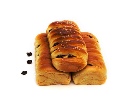 raisin cinnamon bread isolated on white backgroundの写真素材