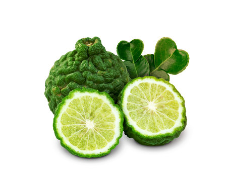 fresh bergamot fruit with leaves isolated on white backgroundの写真素材