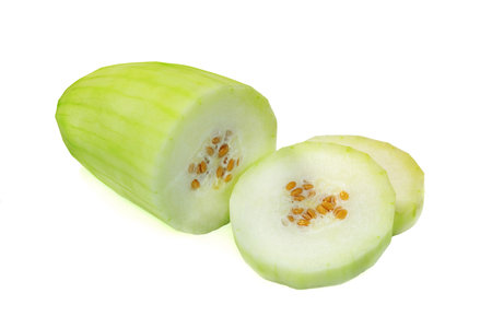 peeled winter melon sliced isolated on white backgroundの写真素材