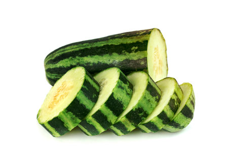 sliced Cucumber or Cucumis melo isolated on white backgroundの写真素材