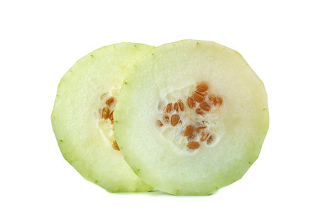 peeled winter melon sliced isolated on white backgroundの写真素材