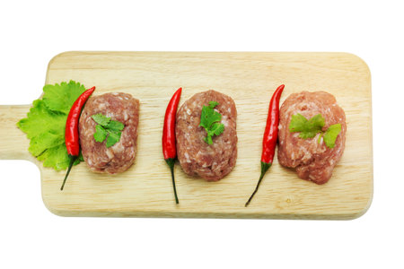 Raw minced pork on cutting board,clipping pathの写真素材