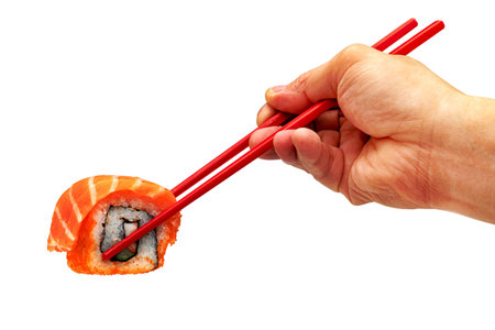 rolled sushi salmon nigiri with red chopsticks isolated on white background, Japanese foodの写真素材