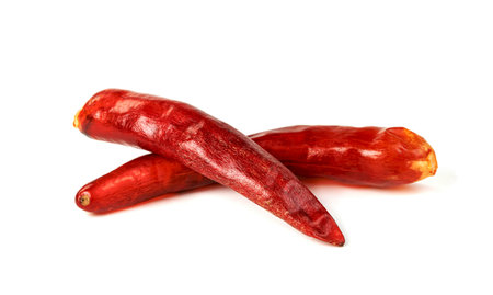 red ground paprika or dry chili pepper isolated on white backgroundの写真素材