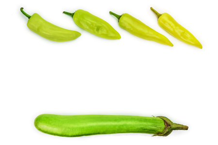 raw green eggplant with green pepper on white backgroundの写真素材