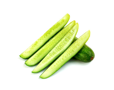 sliced cucumber isolated on white backgroundの写真素材