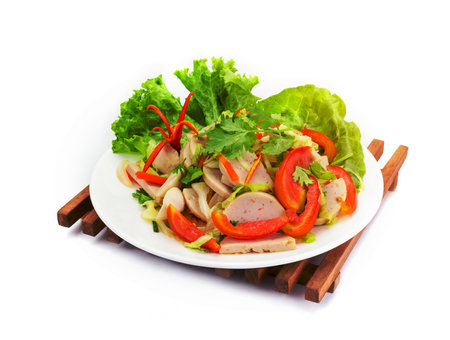 Thai cuisine spicy pork salad on white background or Yum Moo Yor,Spicy Vietnamese Sausageの写真素材