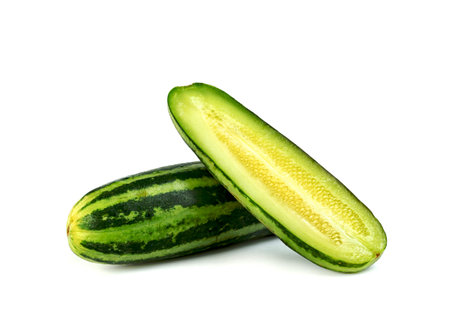 sliced Cucumber or Cucumis melo isolated on white backgroundの写真素材