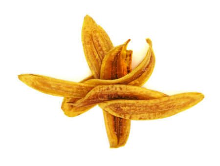 sweet banana crisps  isolated on white backgroundの写真素材