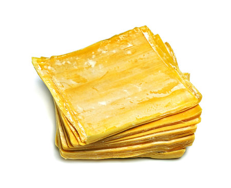 wonton wrapper isolated on white backgroundの写真素材