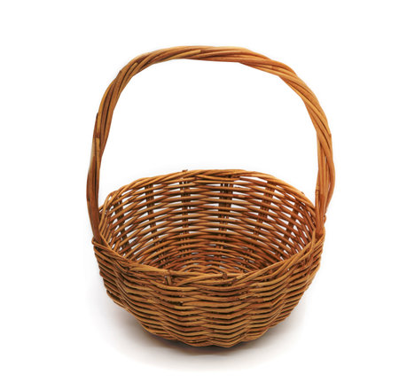 wicker basket isolated on a white backgroundの写真素材