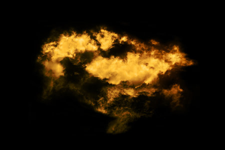 Textured cloud,Abstract golden,isolated on black backgroundの写真素材