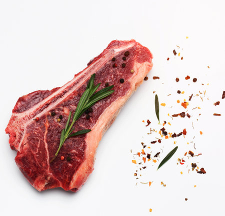 fresh raw piece of beef meat, striploin steakon white background, top viewの写真素材