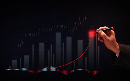 Holographic graph with growing indicators and a man's hand with a marker. Profitable business dynamics, high margin. Growth of indicators on the stock exchangeの写真素材