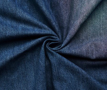 curled blue jeans texture, full frame, close upの写真素材