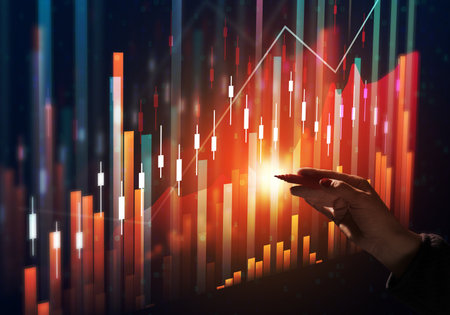 Holographic graph with growing indicators and a woman's hand. Business growth concept, profitable startup, profitable business strategy, sales increase. High performanceの写真素材