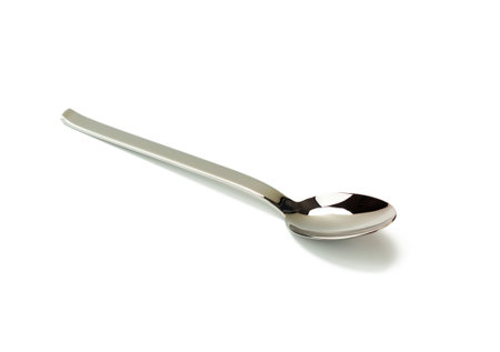large metal soup spoon isolated on white background, close upの写真素材