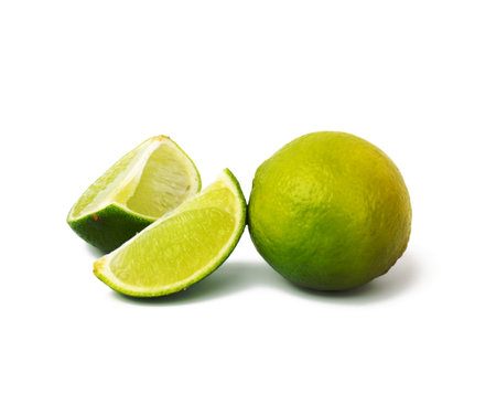 Lime with slice isolated on white background, close upの写真素材