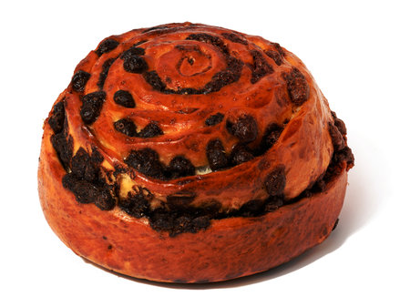 Round baked bun with chocolate on a white isolated backgroundの写真素材