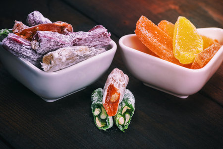 Turkish delight with nuts in a ceramic bowl, top viewの写真素材