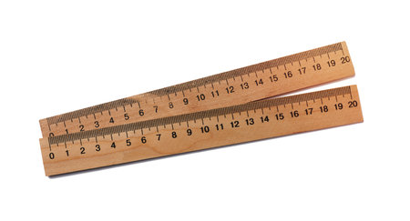 Wooden school ruler isolated on white backgroundの写真素材