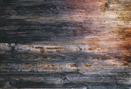 textured gray wood background of old cracked boardsの写真素材