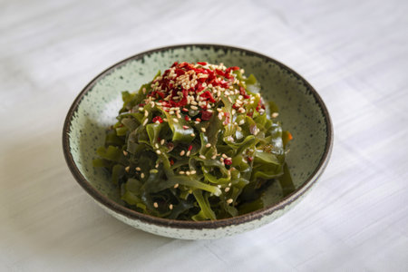 A photo of a bowl of seaweed saladの写真素材