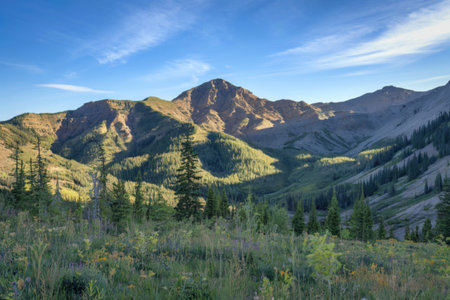 A photo of a mountain landscape with a clear blue sky