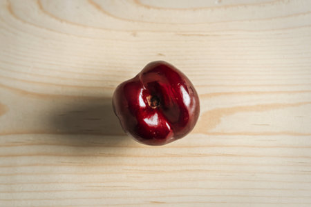 A photo of a ripe cherry from the top viewの写真素材