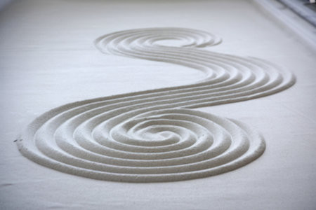 A photo of a raked cement background with a wave patternの写真素材