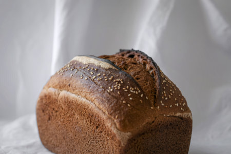 a freshly baked loaf of rye breadの写真素材