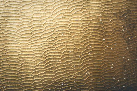 a textured golden backgroundの写真素材