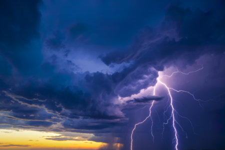 a dramatic and intense scene of nature with dark, ominous cloudsの写真素材