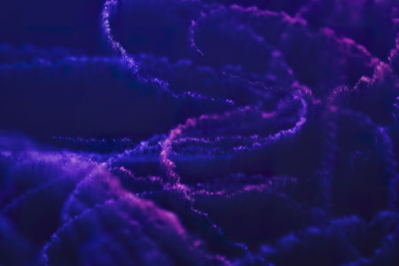 A abstract background featuring countless tiny purple particlesの写真素材