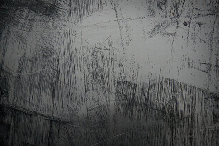 A high-contrast black and white textured background
