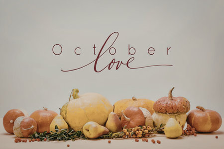 A collection of fruits and vegetables arranged with the words 'October love' on a plain background