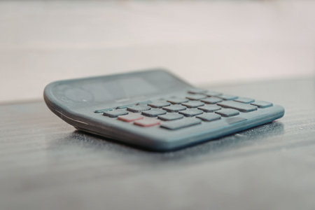 Calculator on a wooden surface