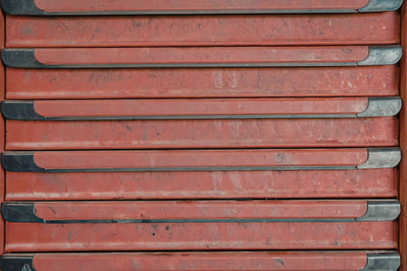 Closeup of red metal drawer handlesの写真素材