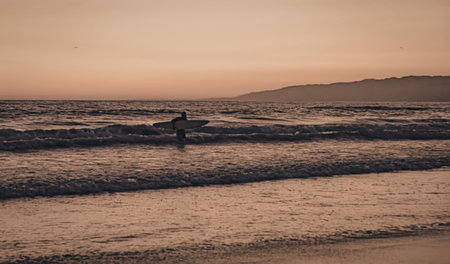 Serene beach scene at sunset